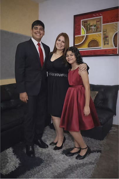 Hispanic family protected by insurance